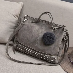 Sac à main bohème pompon